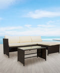 Set divano angolare da esterno Zendea SANTORINI posizionato su terrazza con vista mare, perfetto per area relax outdoor